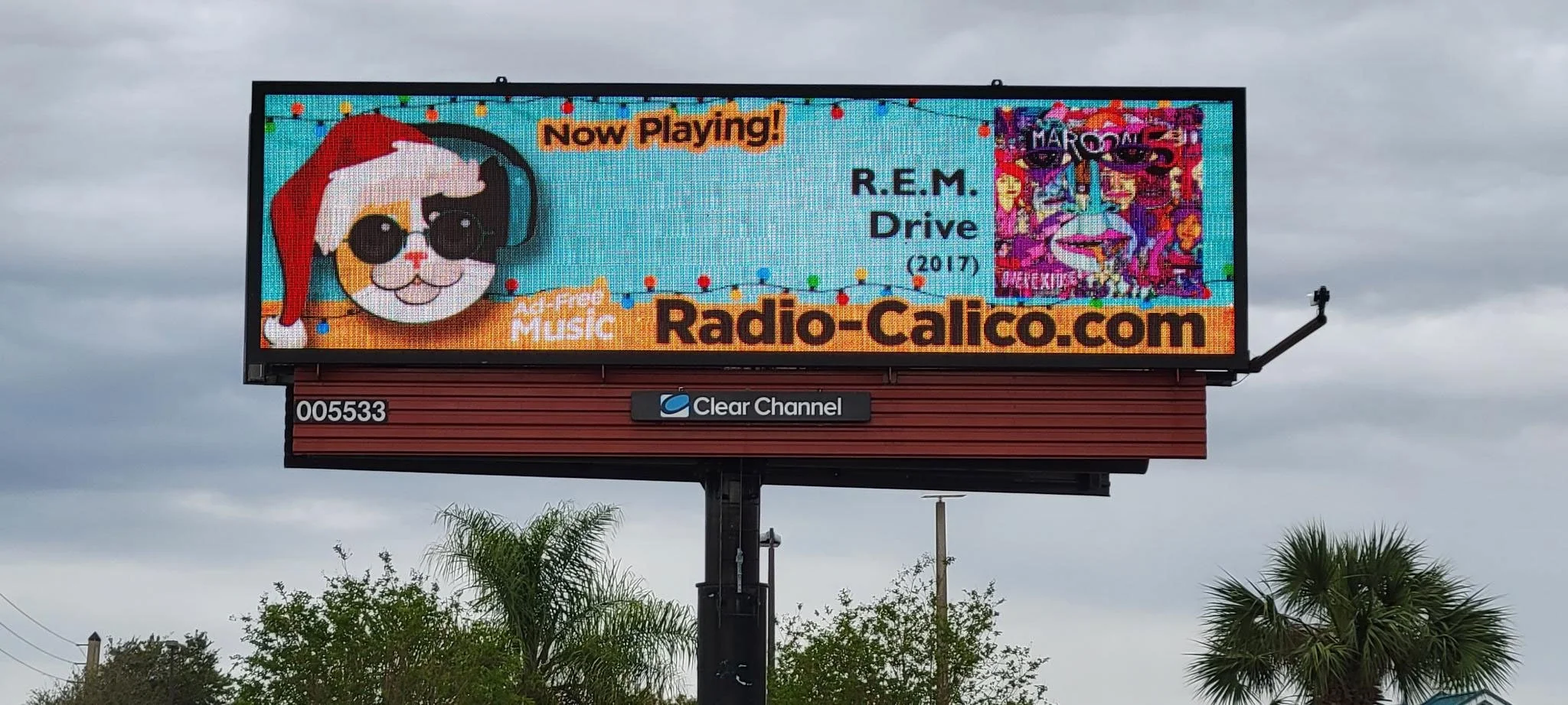 The very first holiday billboard ad campaign seen live featuring the Christmas Santa Claws hat logo.