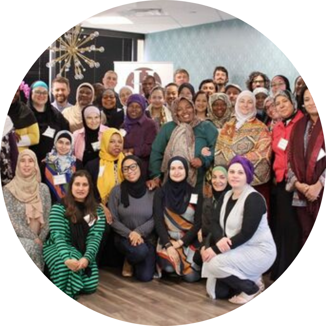 Group of diverse people posing for a photo indoors