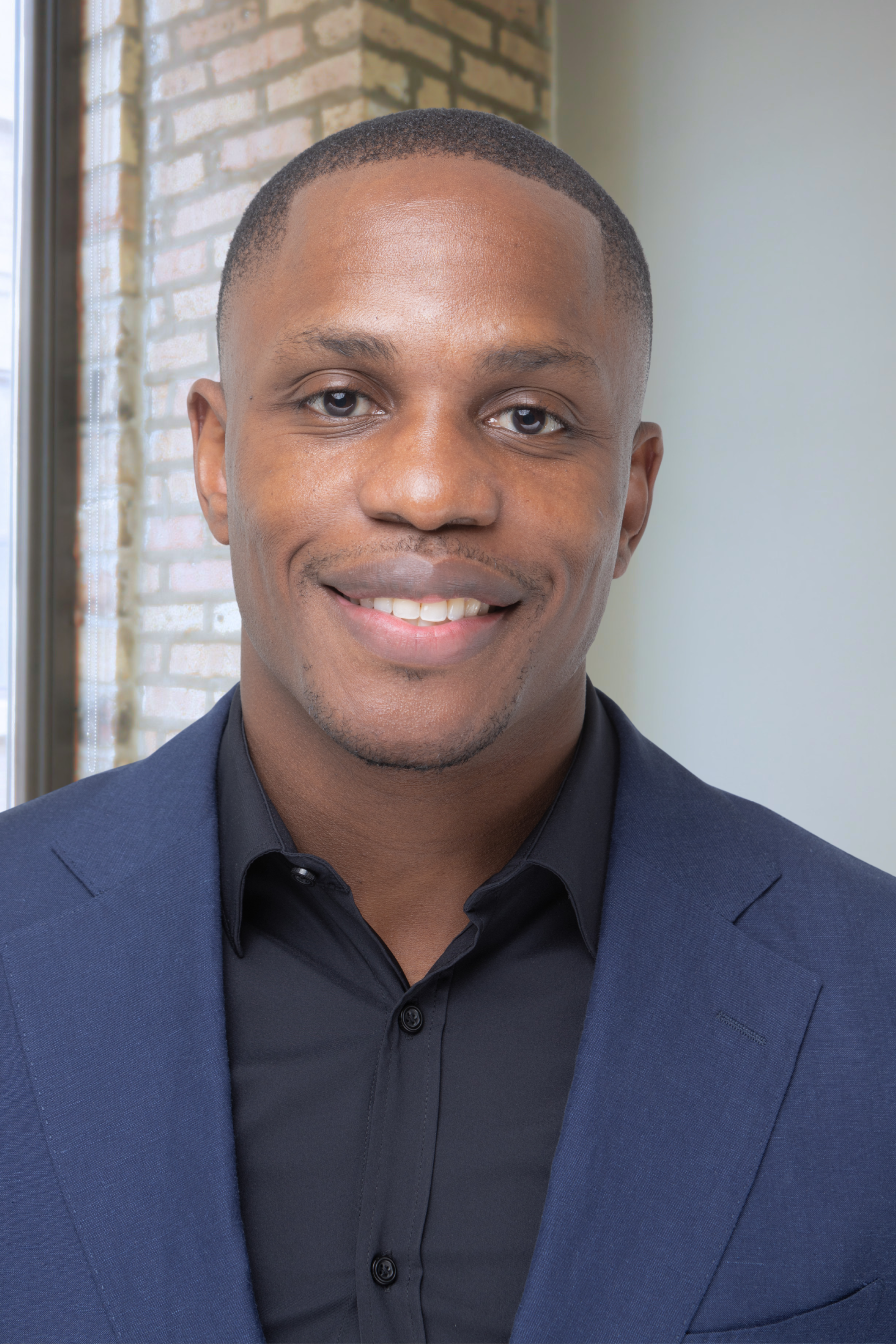 Kevin Itima headshot