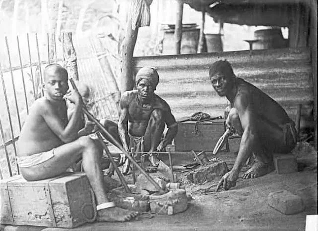 Blacksmiths “from the Onitsha area” according to G. I. Jones, photographed by William Henry Crosse, part of the Royal Niger Company, 1886 - 1895. MAA Cambridge.