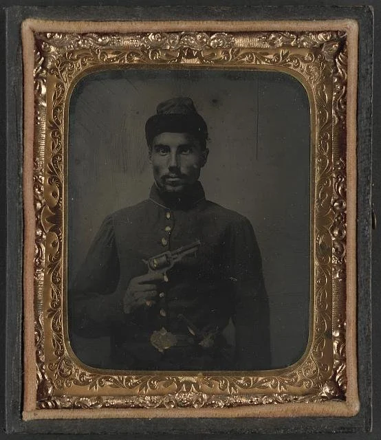 African American soldier, half-length portrait, with pistol and jacket.Library of Congress Prints and Photographs Division Washington, D.C. 20540 USA