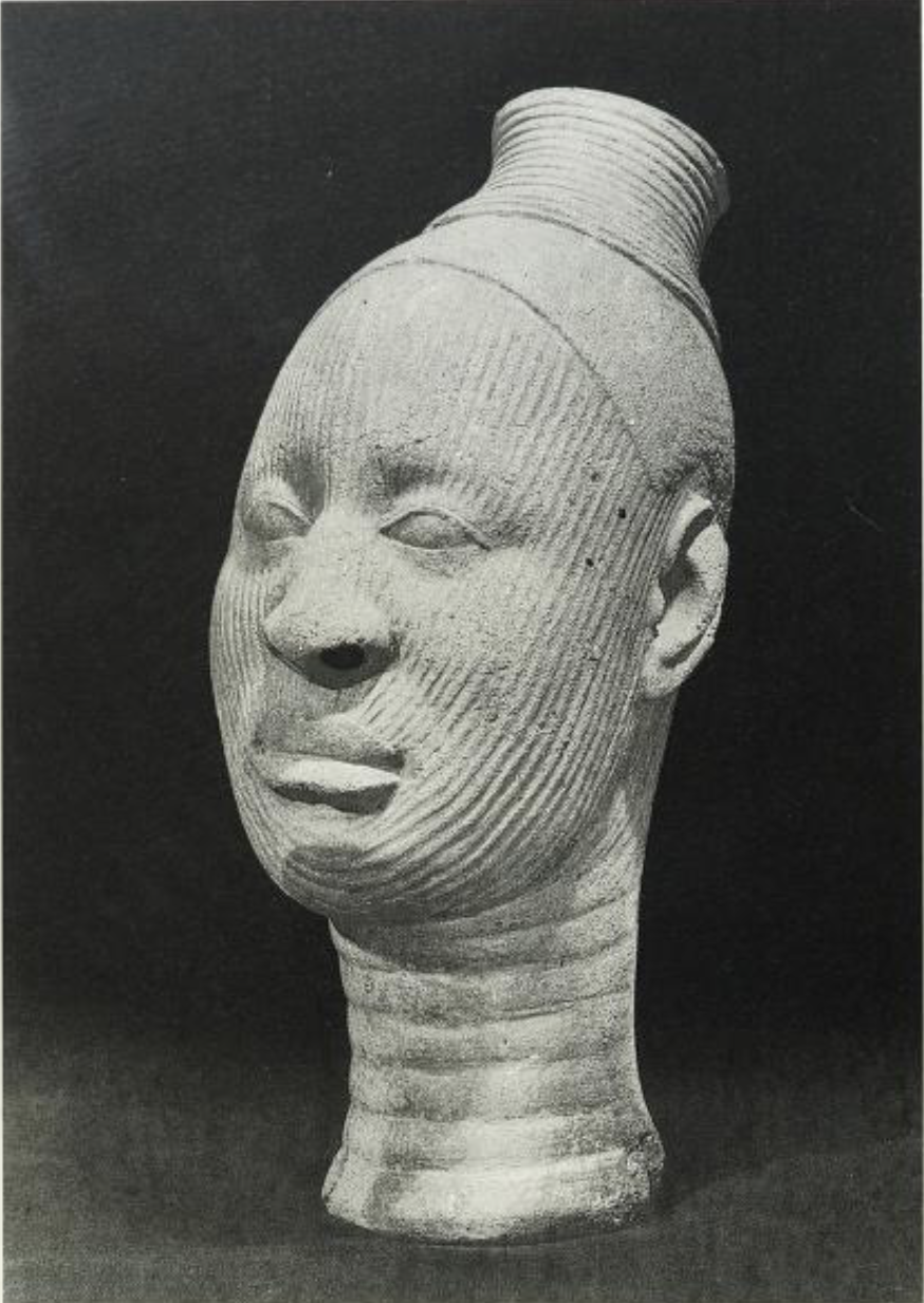 Terracotta human head in naturalistic style. probably between the 12th and the 15h centuries A.D. p52. from Two thousand years, Nigerian art (1977).