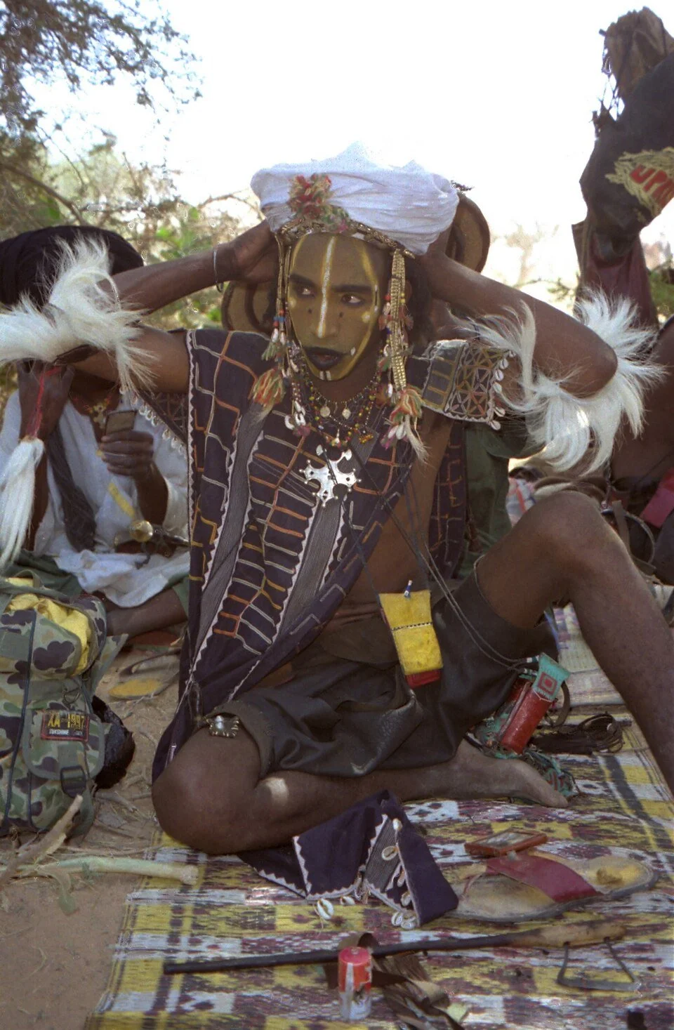 A Wodaabe man preparing for a Yaake demonstration. Niger, 1997.