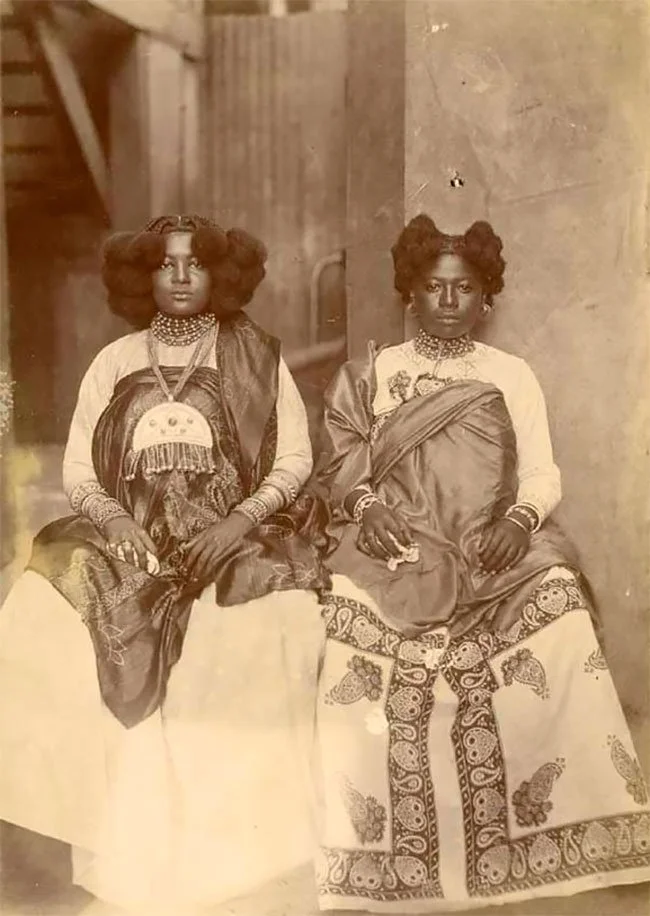 Madagascan women, showcasing their hairstyles, early 20th century. 