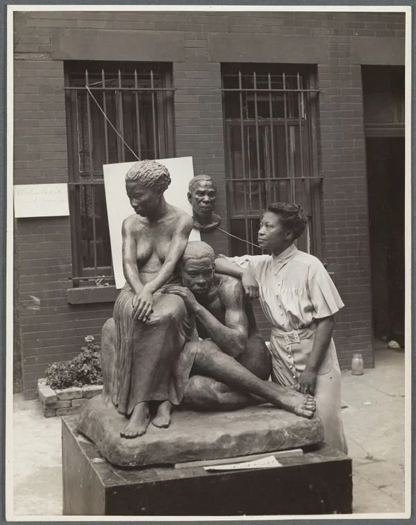 Augusta Savage with her sculpture "Realization" (1936) — Source: Schomburg Center for Research in Black Culture, Photographs and Prints Division, The New York Public Library. "Augusta Savage with her sculpture "Realization"" The New York Public Libra