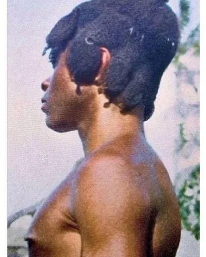 This is the kind of hairstyle worn by young Igbo men around what is roughly present-day Anambra and Enugu States. The photo was taken around the 1920s. Young guys grew their hair like this for the same reasons young guys grow their hair today. Colour