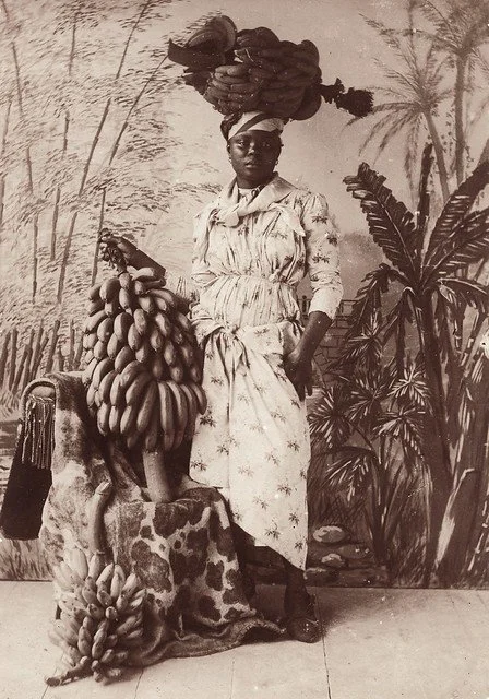 Gaston, F. (1885). Banana Vendor, Martinique. [Photograph]. The Caribbean Photo Archive. https://www.caribbeanphotoarchive.com