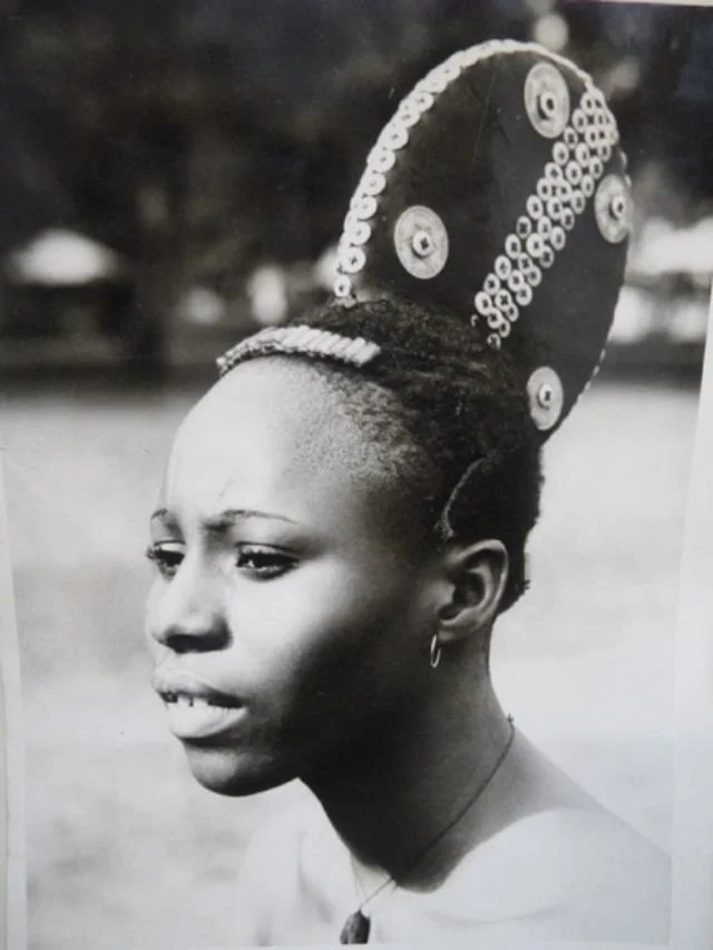 Elaborate headdress worn by a woman circa 1960, Nigeria. Sourced from Vintag.es.