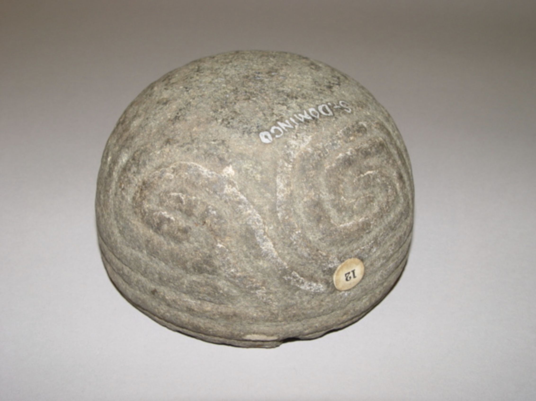 Stone Bowl (Possibly for Bruising Grain). Stone; Diameter 14.50 cm × Height 8 cm. Santo Domingo, Dominican Republic, Hispaniola, Caribbean (Greater Antilles). This carved stone bowl, possibly used for bruising or grinding grain, was excavated in Sant