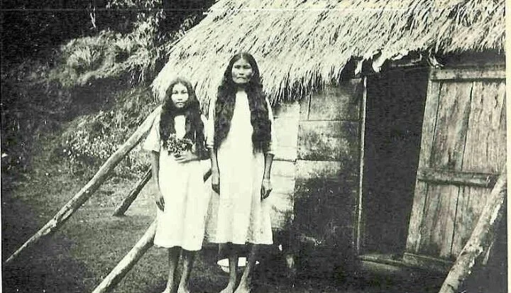 Taino Mother & Daughter Outside of their Bohio 1900s