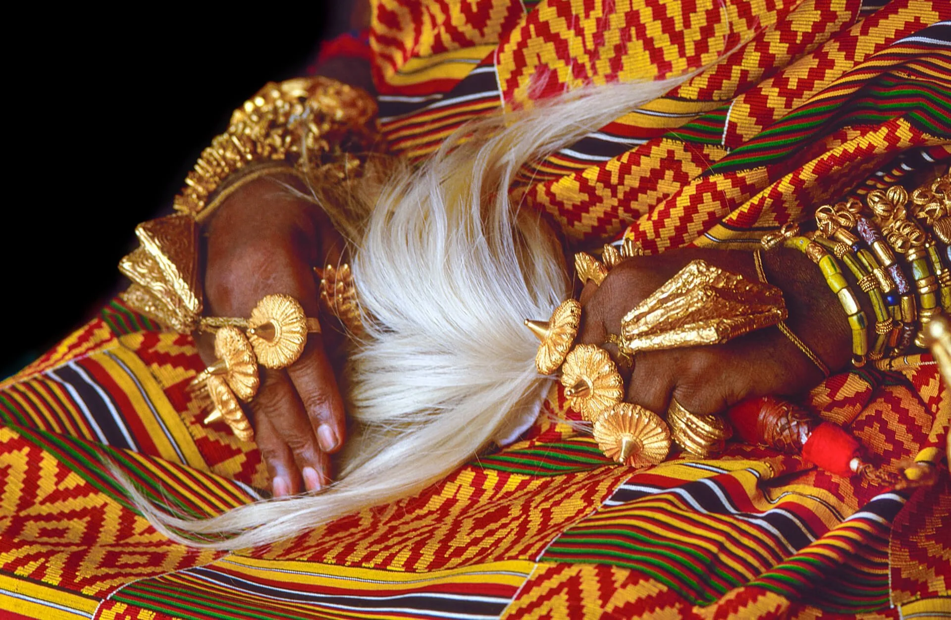 The Asantehene’s golden jewellery, Ghana.Unknown photographer. (n.d.). The Asantehene’s golden jewellery, Ghana [Photograph]. Africa Online Museum. https://africaonlinemuseum.org/map/ghana/ashanti-kingdom/photos/
