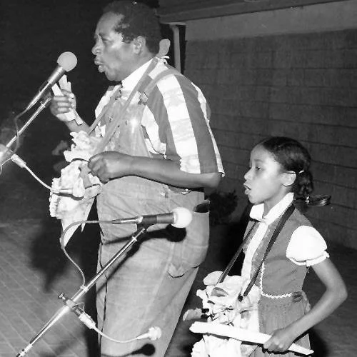 Abner Jay and his daughter, Brandie, playing Rattle of the Bones