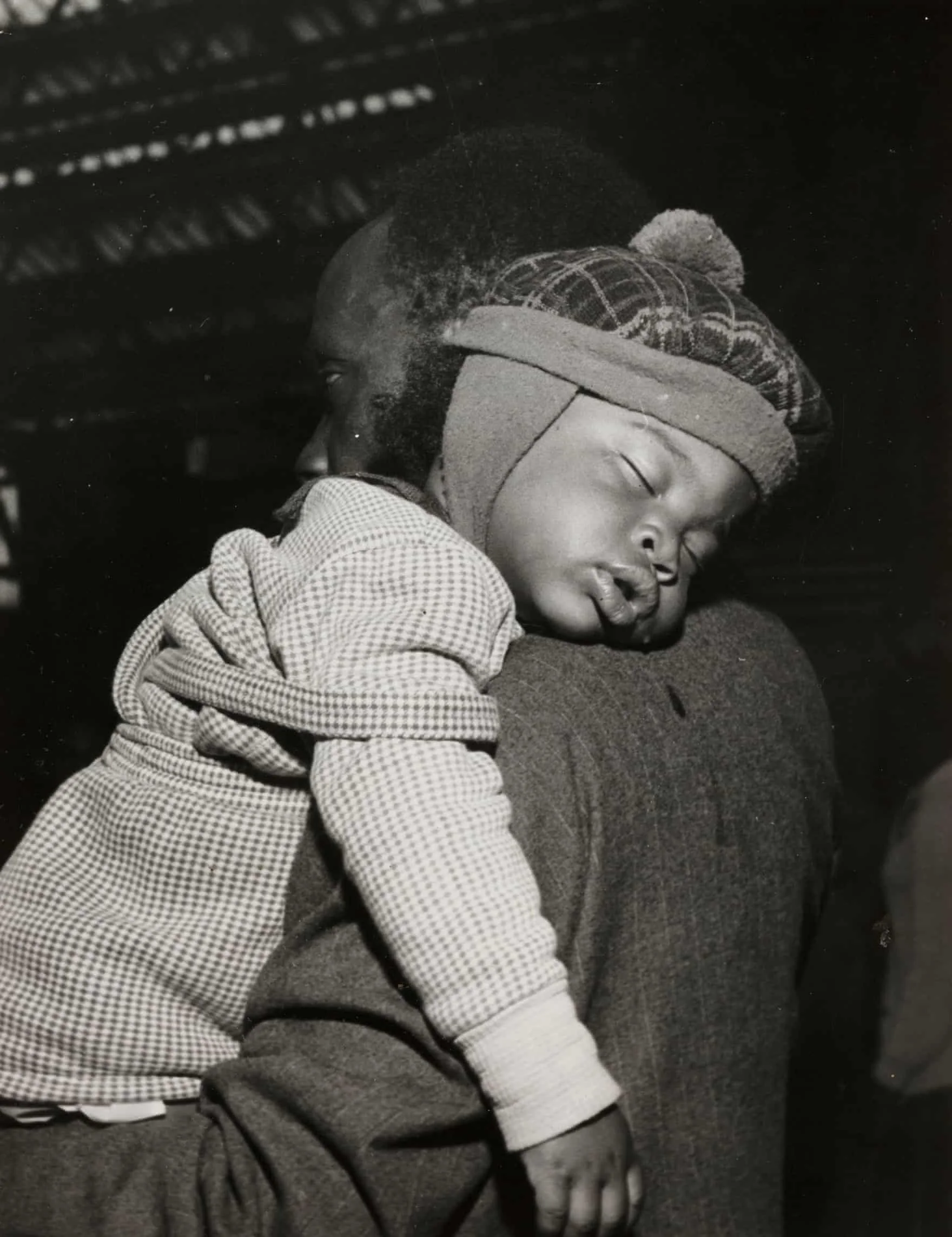  A child takes a nap after a long journey to Victoria station in London
Photograph: Daily Herald Archive/SSPL via Getty Images. 'Windrush arrivals embark on a new life in UK – archive photos', Joanna Ruck, The Guardian, Apr 2018. 