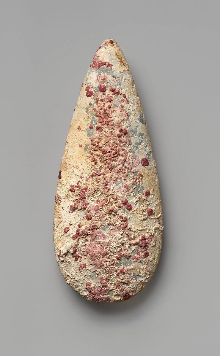 Stone Celt. Before the 16th century. Taíno culture; Dominican Republic, Caribbean. Carved stone implement (Height: 6 7/8 in. [17.5 cm]), shaped by Taíno craftspersons through percussion and grinding techniques to produce a functional and polished too