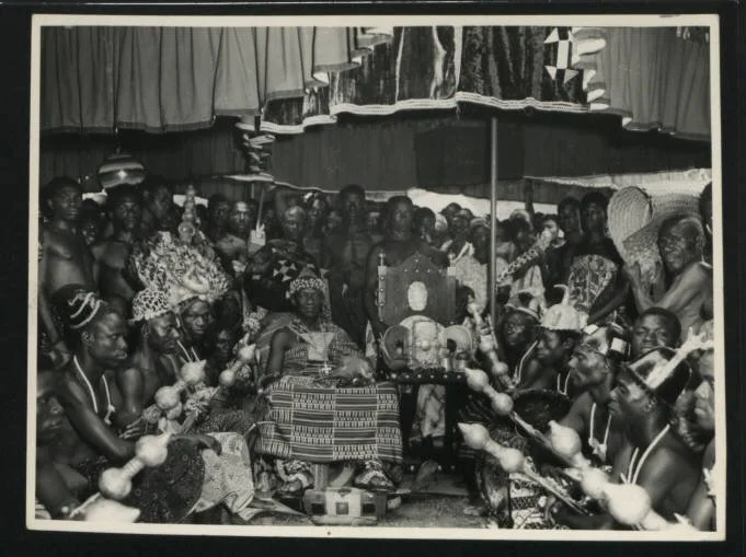King Otumfuo of the Ashanti Empire sits on his throne. The Ashanti Empire won its independence from Britain in 1931, after being forced into three decades of life as a British Protectorate. Kumasi, Ashanti Empire. 1953. 
image credits: ati