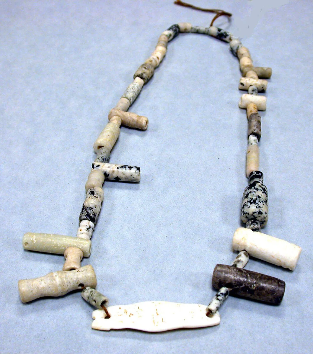 Beads. 10th–15th century. Taíno culture; Dominican Republic, Caribbean. Stone beads (diameter 3/8 in. × length 1 5/8 in. / 1 × 4.1 cm) comprising part of a necklace or ornament. These small carved stone beads reflect personal adornment practices amon