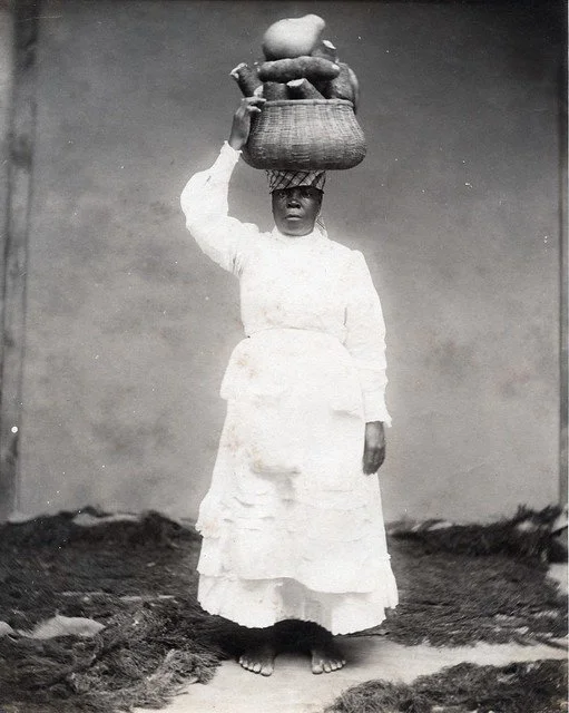 A. Duperly & Sons. (1890). Yam Seller, Jamaica. [Photograph]. The Caribbean Photo Archive. https://www.caribbeanphotoarchive.com