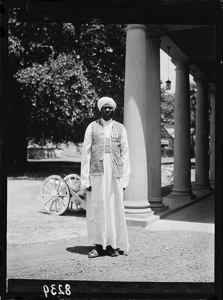 Government House from across the lawn, Nubian guard close up, Entebbe, Uganda, photograph by Matson Photo Service, 1936. Source: Library of Congress, G. Eric and Edith Matson Photograph Collection. 