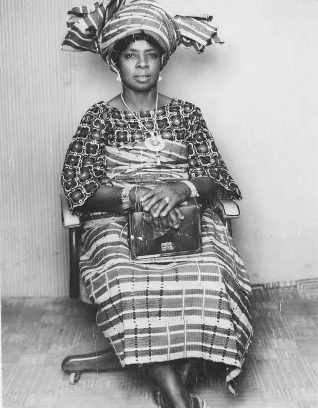 Madam Esther Suwaola wearing Aso-Oke fabric and a Gele headtie, 1960.