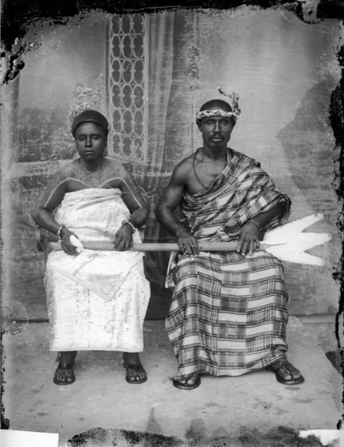 Bruce-Vanderpuije, J. K. (1930s). Chief fisherman and his wife [Photograph]. Akadi Magazine. https://www.akadimagazine.com/post/photos-of-1930s-gold-coast-life-to-showcase-at-dubai-2024-exhibition