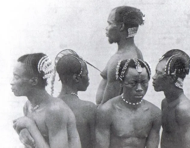 Afro Hair Archive. (n.d.). Men’s hairdressing, Sango, Upper Mobangi River, Democratic Republic of Congo [Photograph]. Early 20th century, The Minister of Colonies, Belgium. 