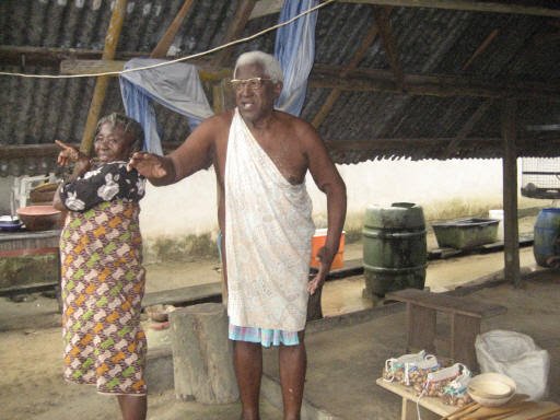 An elder of the Santi Ground community, Saramaka, and another member of the community