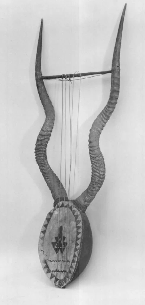 East African lyre made from a gourd and antelope horns.