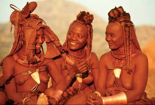 Himba women during a bridal party. Image from Peter Schnurman via Trip Down Memory Lane blog.