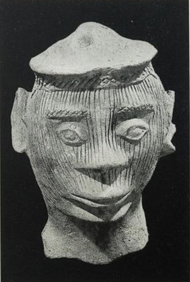 Terracotta head of a man in an unrefined style not typical of classical Ife style. it has been suggested that it is of post-colonial Ife period. from Mokuro stream. P.58. from Two thousand years, Nigerian art (1977).