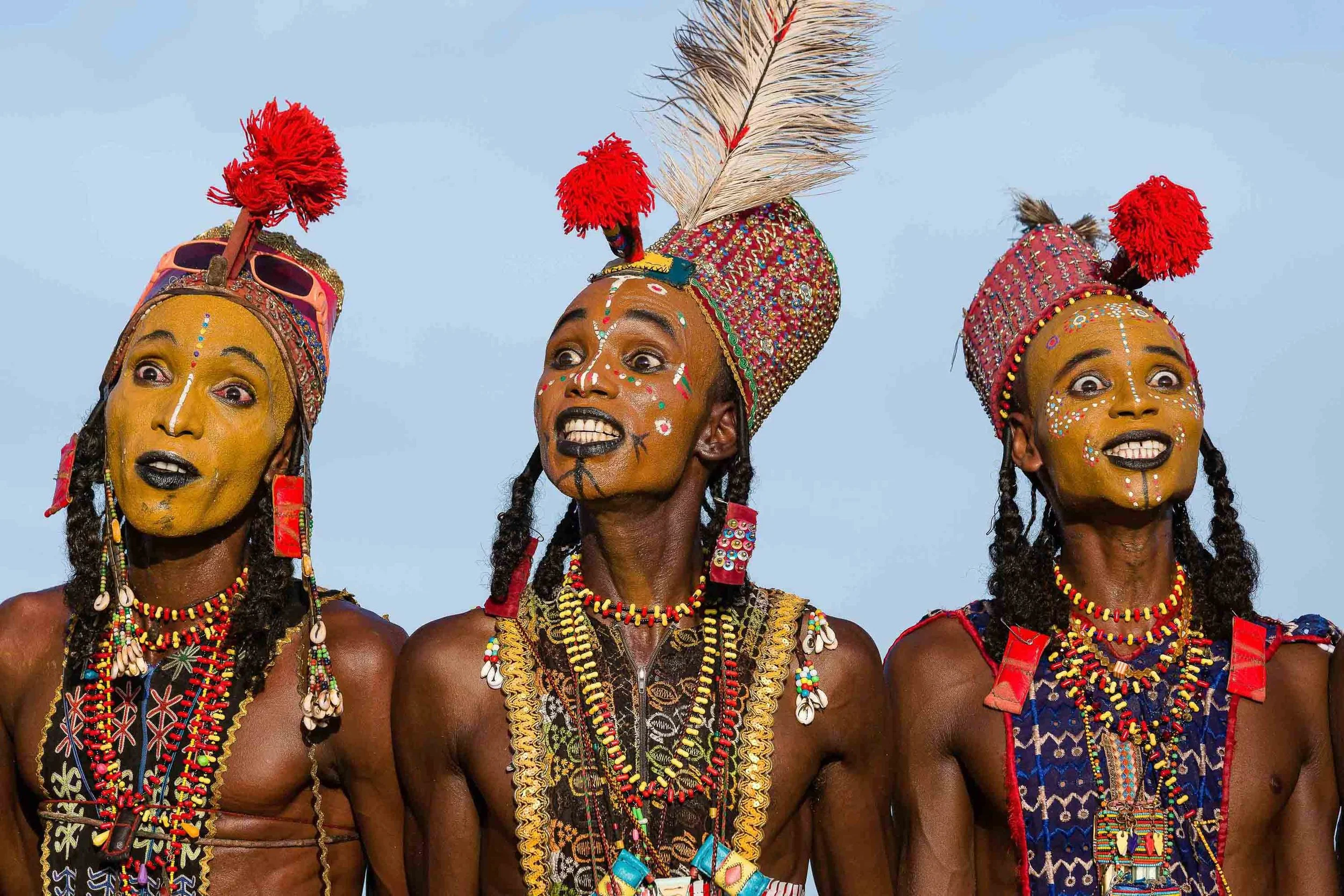Three Wodaabe men perform their ritual dance the ‘Yaake’, where every element and gesture has a significance.Photo: Tariq Zaidi