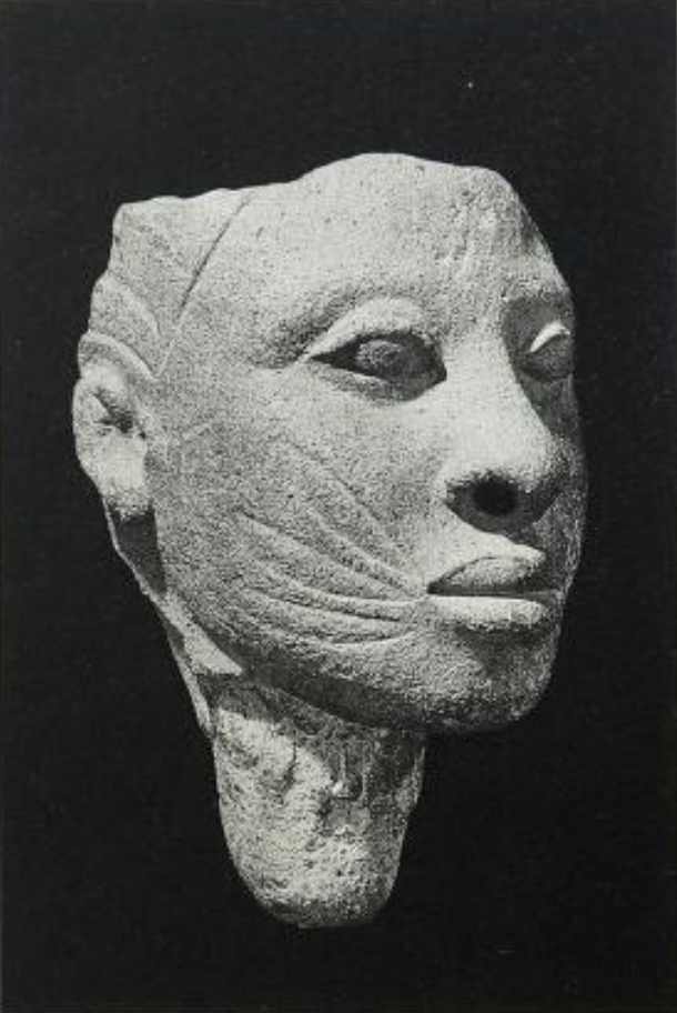 Terracotta human face with cat-whisker mask. From Olokun Walode Grove, ife. made between 12th century and the 15th century A.D. p.50 from Two thousand years p.48, from Two thousand years, Nigerian art (1977).