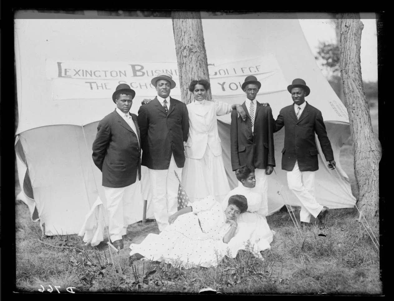 photograph of the Jubilee Singers posing at the Lexington Business College in Lexington, Nebraska. by photographer Solomon D. Butcher, in 1909.