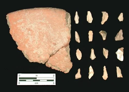 Ceramic Burén and Grater Teeth. 1200–1500 CE. Taíno culture; En Bas Saline, Haiti, Caribbean. A domestic ceramic burén (griddle) paired with microlith grater teeth, uncovered in archaeological deposits at the En Bas Saline site. The burén was hand-fo