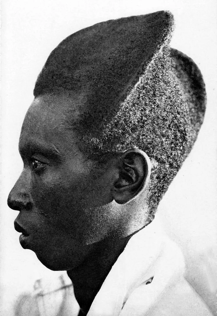 Amasunza man with styled Afro. 