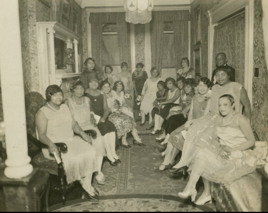 Casper Holstein entertaining guests during Ladies Night at the Turf Club in 1923. Retrieved from the Schomburg Center for Research in Black Culture, Photographs and Prints Division, The New York Public Library.