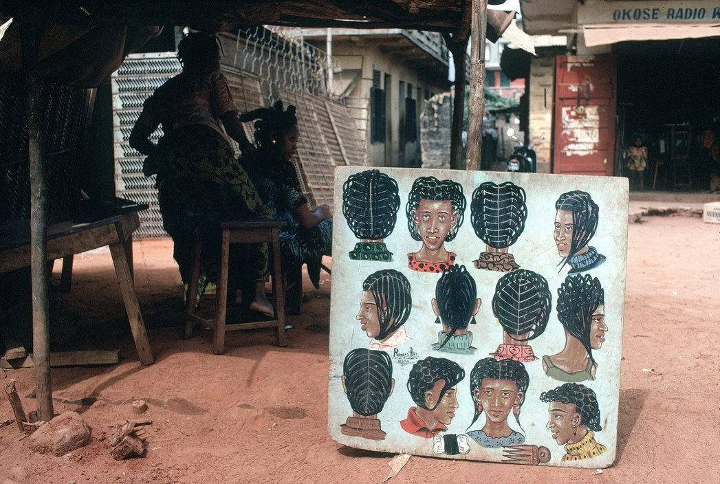 Lagos, Nigeria. A traditional hairdressing salon, 1974, Bruno Barbey