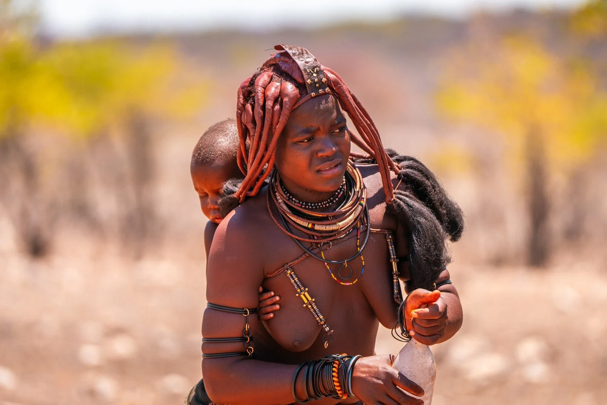 A Himba mother at Omapaha Etosha, Himba Village.