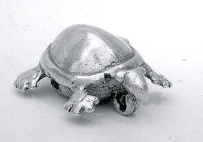 Turtle Bell. Gold; Length 3.3 cm × Width 2.7 cm. Central Caribbean Region (likely Costa Rica), ca. 900–1520 CE. This small gold bell is cast in the form of a turtle—a motif common in Isthmian metalwork and iconography of the Veraguas-Chiriquí traditi