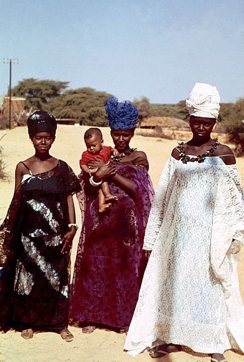 Senegalese women wearing a boubou, photographed by Harrison Forman in the 1960s.
