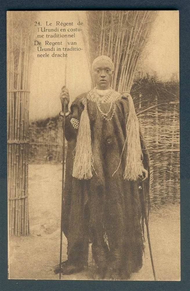 The Regent of Urundi wearing an Imbega with ceremonial tassels, 1900s.