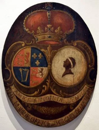 rms of the Anglo-Corsican King (1794-’96)
As on the shield of The Marine Office / Scagno di Marina. (Coll. Museum Bastia).
The dexter arms are those of King George III and the motto reads: AMICI E NON DI VENTURA