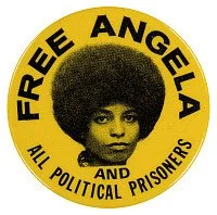 ANGELA DAVIS (1944- ).
Free Angela and all political prisoners. Button created to free political activist Angela Davis from prison, c1971.
