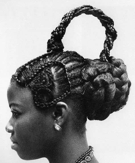 "Abebe" by Nigerian photographer J. D. Okhai Ojeikere, 1975. Showcasing a Nigerian hairstyle.