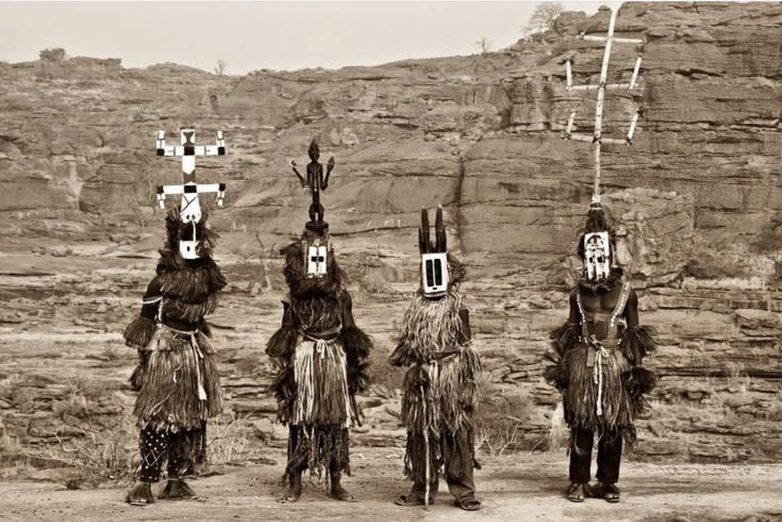 Dogon dancers wearing traditional Kanaga masks during a Dama funerary ritual in Mali, West Africa.