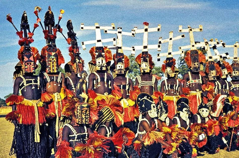 Dogon tribesmen wearing the Kanaga mask.