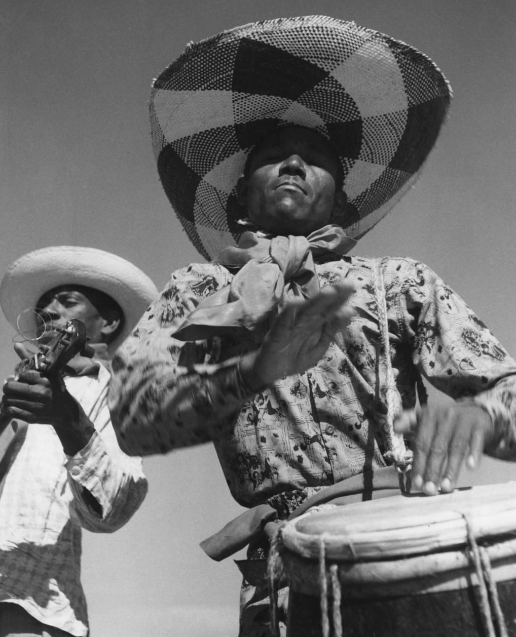 A Haitian drummer in Port-au-Prince (1950) [Photograph]. In 100 years of photography in the Caribbean in pictures. The Guardian.