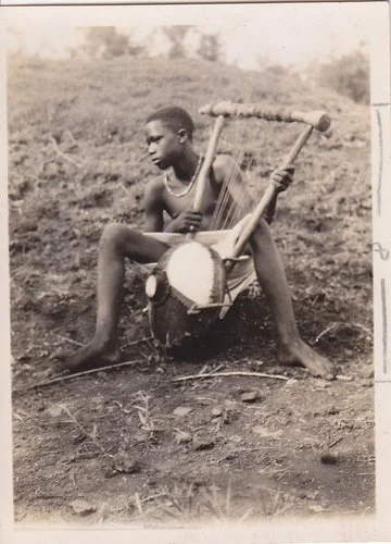 North African boy playing the kissar. 