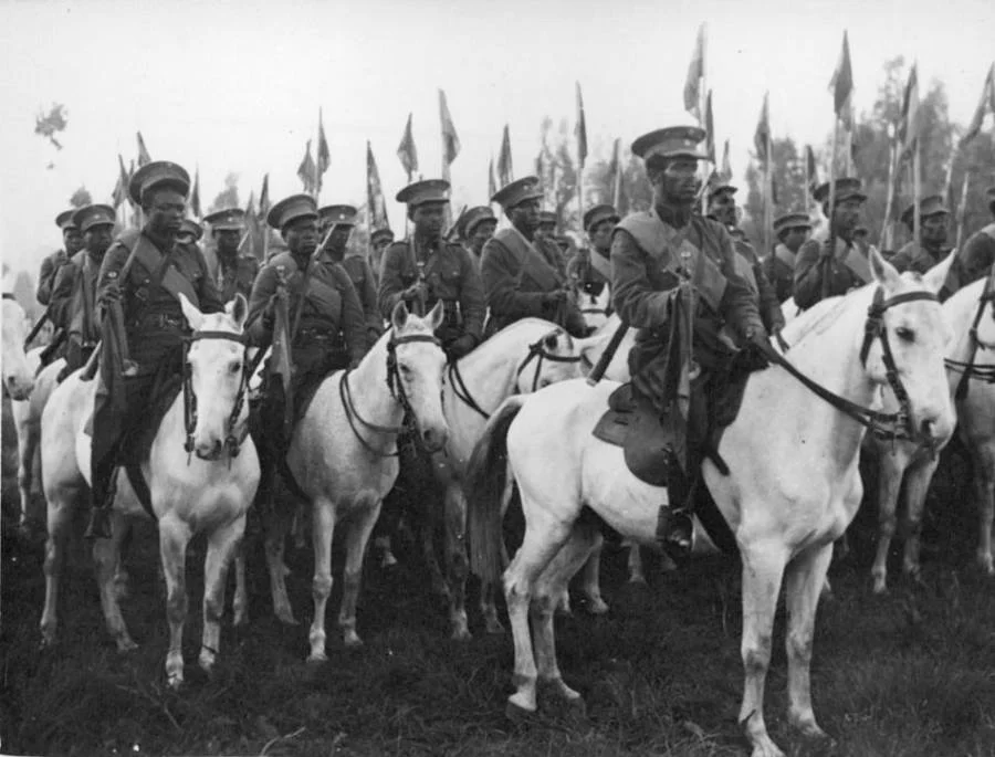 Ethiopian soldiers on horseback prepare for war against the fascist Italian army. 1936.

image credits: ati