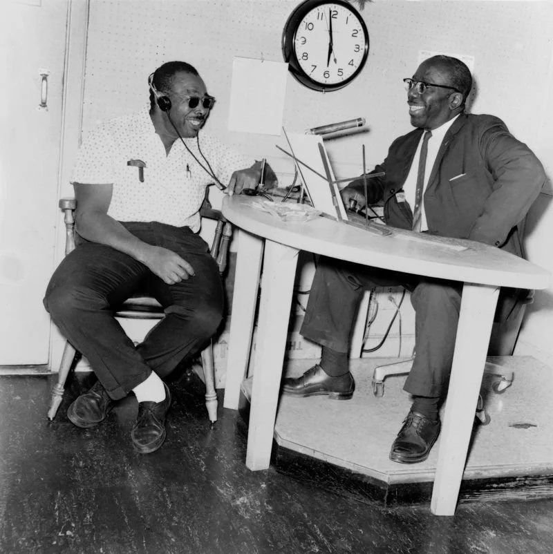 Nat D. Williams at the mic, interviewing for WDIA. Dr. Ernest C. Withers, Sr. courtesy of the Withers Family Trust.