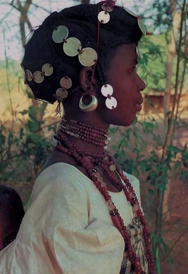 Haute Volta (Upper Volta), “Face of High Volta,” young Peulh mother.